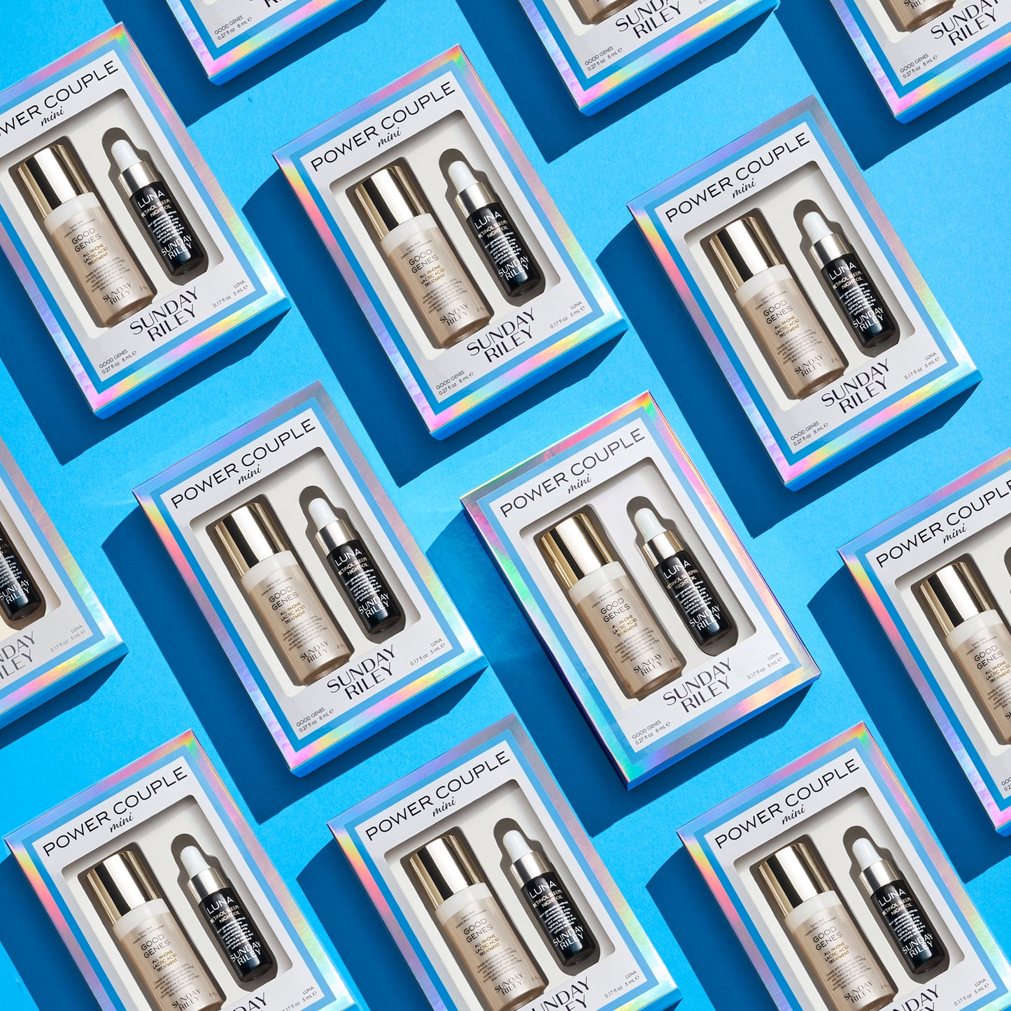 Numerous Power Couple kits laid out in diagonal rows against a light blue background