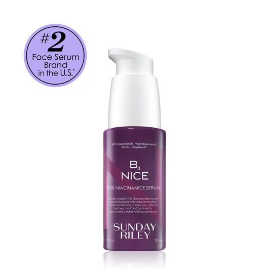 Purple serum bottle with white pump labeled 'B3 NICE' by Sunday Riley on a white background.