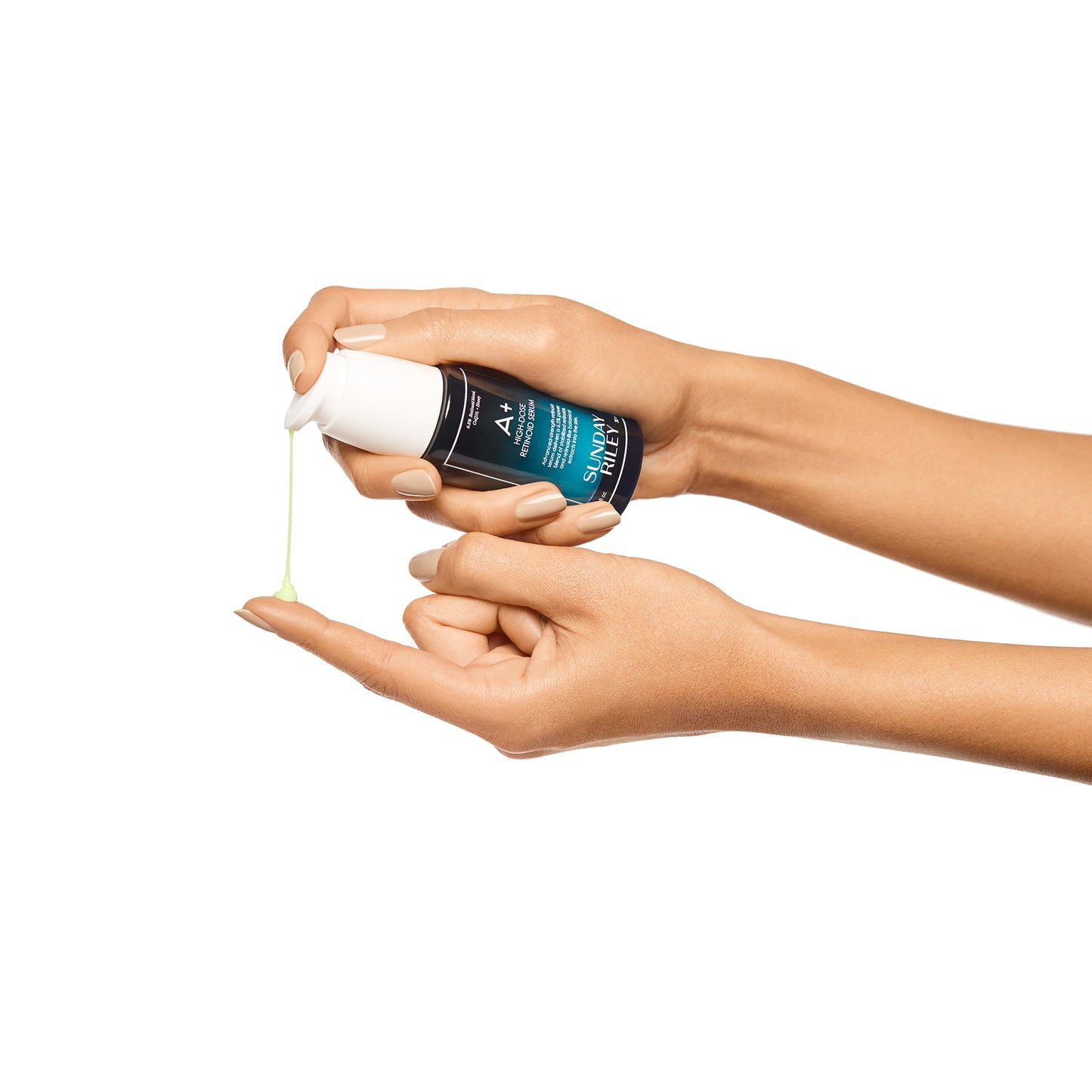 A + retinoid serum being dispensed onto finger tip